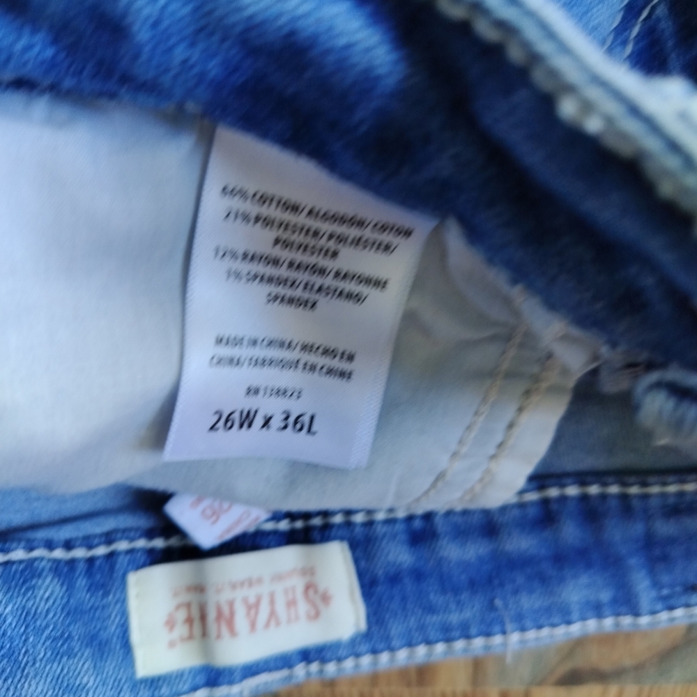 Shyanne Super Flare Women's Jeans feature a distressed knee design - Picture 11 of 12